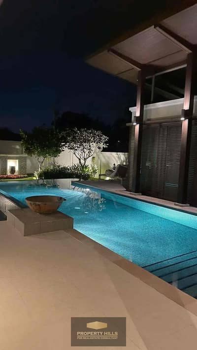 Receive a standalone villa with a huge swimming pool, area 643m, in Hassan Allam on Axis 26 at WEST MARK next to Rem Residence, La Vida Al-Bustan, Al-Bustan Residence, W Ab Villa, and Joya