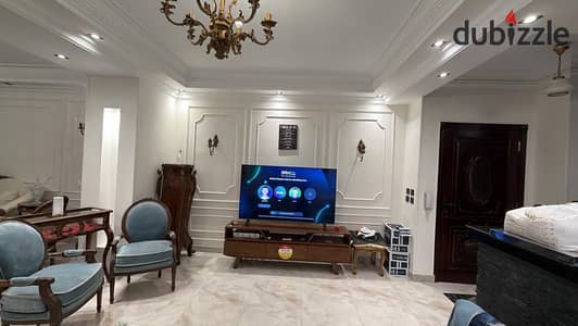 For sale in Al Banafseg Villas, a 190 sq m ground floor apartment with a kitchen, finished to a super deluxe standard.