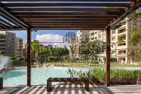 Under market price Ground apartment at The square Al Ahly Sabbour north oriented very prime location open view