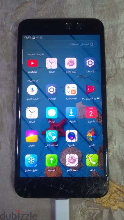 ايتل s32 lite يعمل بامتياز جدا جدا شرخ فى الباغه الخارجيه غير مؤثر نها