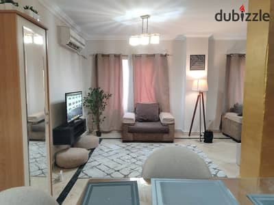Available furnished apartment for rent in Al Rehab with three bedrooms next to services