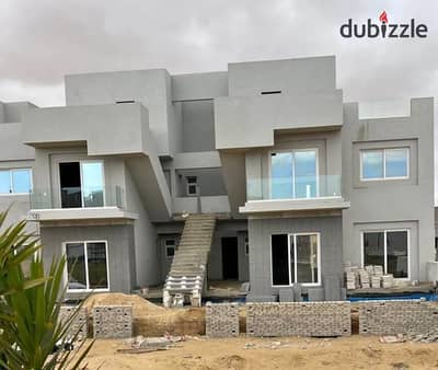 Apartment with garden for sale, featuring a prime view in Dunes Compound, Sheikh Zayed, directly in front of Beverly Hills
