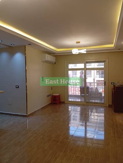 Apartment of 96 meters for sale in Madinati, Talat Mostafa, kitchen, air conditioners and two modern bedrooms.