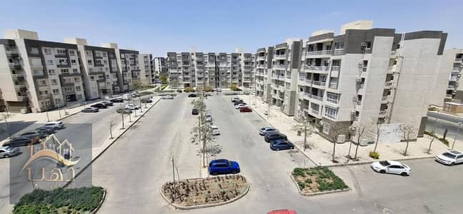 For sale in Madinaty, a 116m apartment B12 with an open view, premium super ultra finishes, on a distinctive floor, in an excellent location in front of East hub mall, craft zone in Madinaty, New Cairo