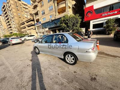 لانسر بومة 2006 للبيع حالة رائعة