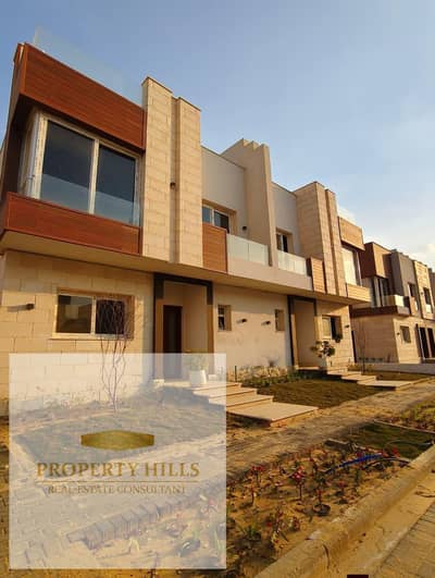 lowest price townhouse prime location greenery view with installments over 10 YEARS  IN AZZAR compound at golden square fifth Settlement in new cairo!