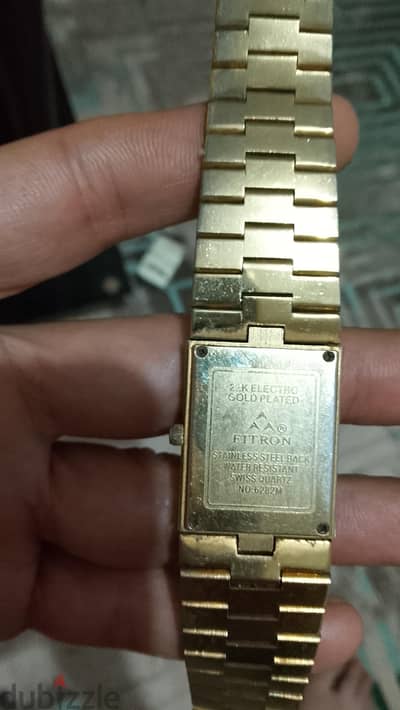 ساعة سويسري  ماركة QUARTZمطليه بالذهب