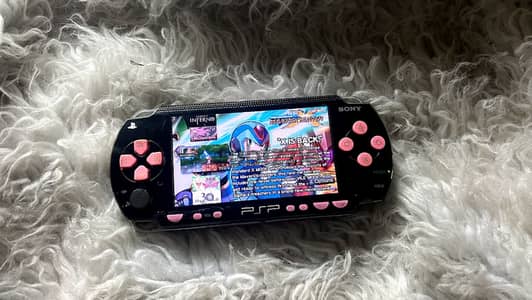 psp 1000 +لعبة80 +شاحن + الكرت8جيجا +بطارية