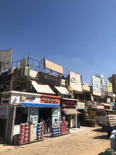 محل للبيع حي ٣ مام البنك الأهلي فرع الكفراوي سنتر مصر  أكتوبر