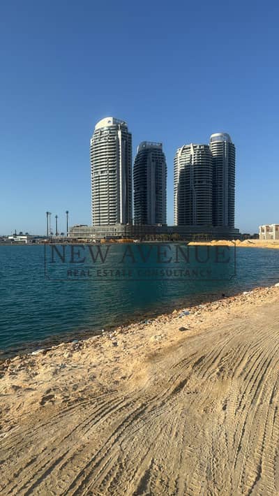 Fully Finished and Furnished Chalet view Sea, Pool, Garden and Alamein Towers for sale Palm Hills New Alamein