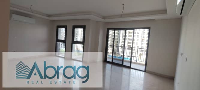 For rent: 165 sqm double-view apartment in ZED West, Old Sheikh Zayed, with kitchen and air conditioning. Landscape view.