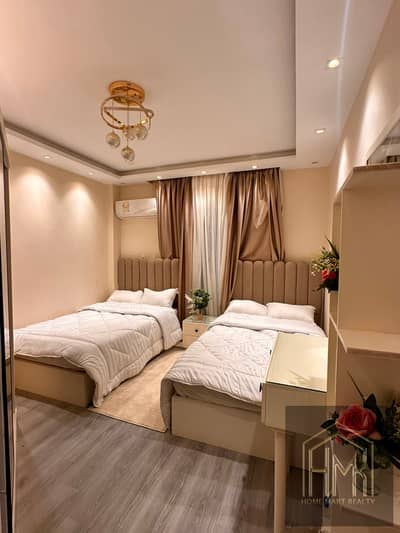 Furnished apartment for rent in Al Rehab Compound (monthly or daily), immediate occupancy, furnished and finished to hotel standards.
