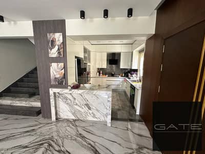 Townhouse for sale at a bargain price in Al Patio 6 compound, fully finished to an ultra-super-lux standard, furnished and equipped