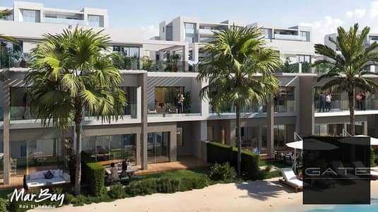 Corner townhouse for sale in Mary Bay - Al Marasem, 200m² built-up area, 245m² land, direct lagoon access, installments until 2032