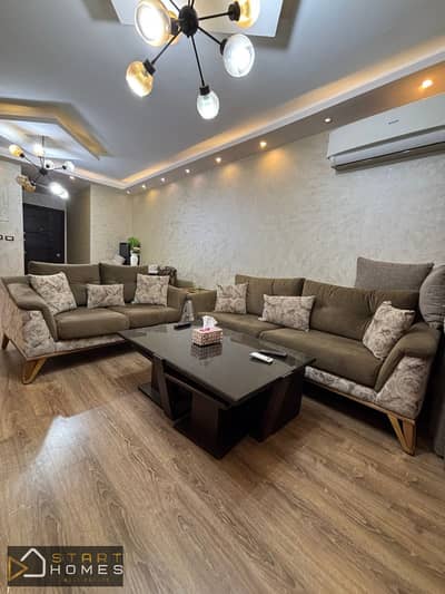 140 sq m apartment + 45 sq m garden, 3 furnished rooms for rent in Madinaty B6, ready for immediate occupancy, directly opposite South Park and bus st