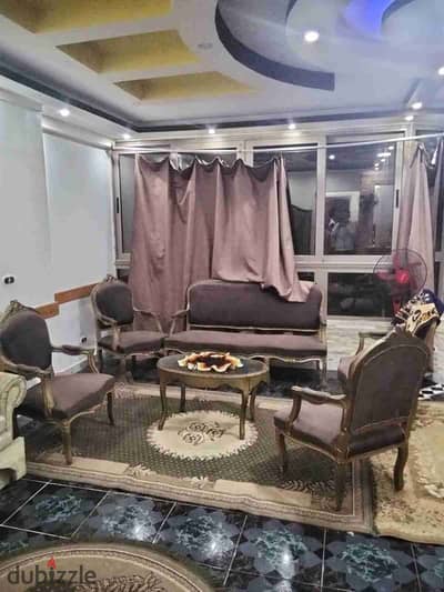Furnished apartment, home furniture for annual rent, 2 bedrooms, reception two pieces, kitchen, 2 bathrooms, first upper floor, all facilities available, water and electricity in Alexandria, Al-Ajami, kilo 21, on the Palm Beach, second line from the sea, in a very distinguished location.
