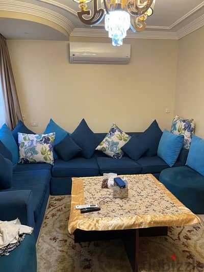 used blue sofa