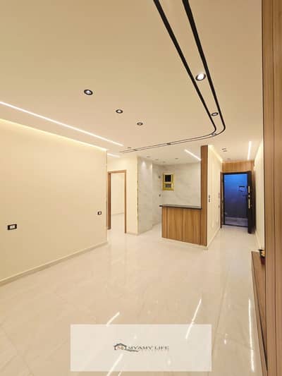 For sale in a prime location in the Pyramids Gardens, an 80-meter apartment with an old loading in the back, 2 rooms, 2 bathrooms, a kitchen, and a reception. First floor in a new building, built in 2025, close to services. Price: million.