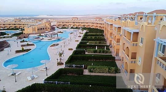 شالية ارضى مميز 130 متر مع جاردن 130 متر قرية رويال بيتش الساحل الشمالى