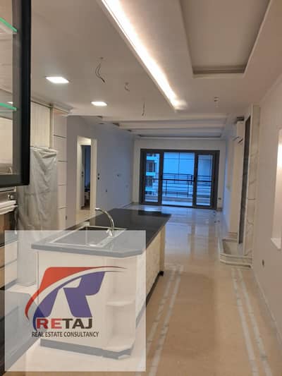 A distinctive apartment for sale in the Go Heliopolis Compound in New Cairo, featuring modern finishing, an open view, and 24-hour security in a prime
