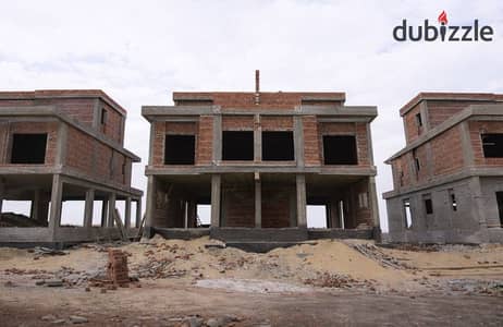 Twin Villa for sale in Sheikh Zayed in installments