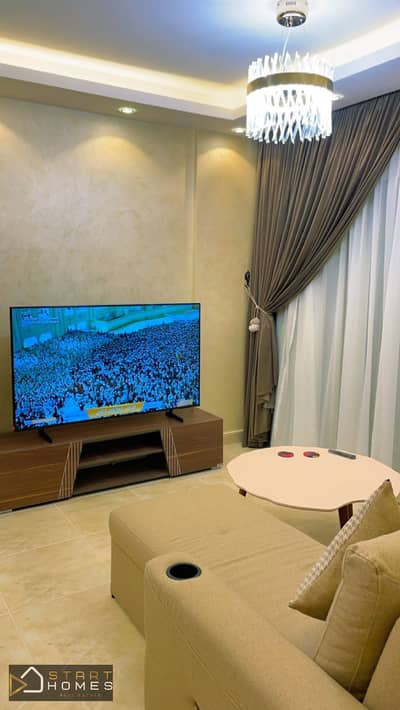 Ground floor apartment, 87 square meters, with a private garden of 45 square meters, furnished, for rent in Madinaty B12, opposite All Seasons Park an