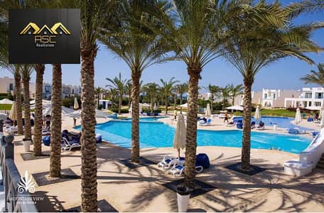 Lowest Price Penthouse 2bed for Sale in Mountain View Ras El Hekma North Coast - Direct Pool View - Super Lux Finishing - Prime Locatio - Private Roof