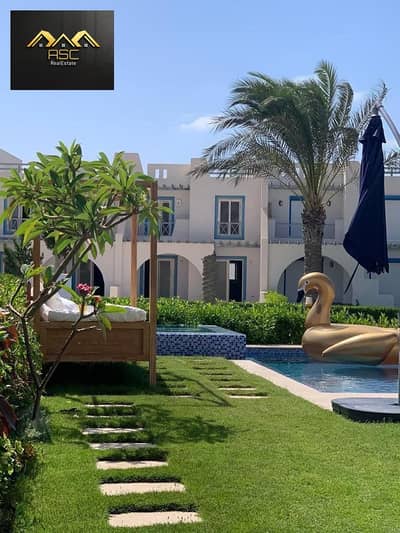 Lowest price ground floor chalet with garden Ready to Move  In Mountain View Ras El Hekma, North Coast   swimming pool View   Area: 92 m  Garden: 50 m