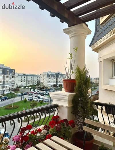 Two-bedroom apartment for sale in Mountain View Compound, next to the American University, opposite Mivida Compound, with equal installments