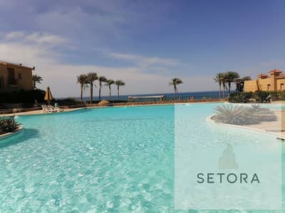 Chalet for sale in La Vista Gardens, Ain Sokhna, fully finished and ready for immediate occupancy. It boasts a stunning sea view