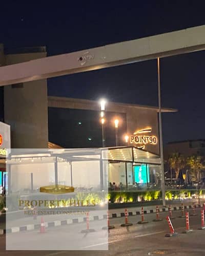 محل للبيع امام الجامعه الامريكيه بالتقسيط علي 7 سنين