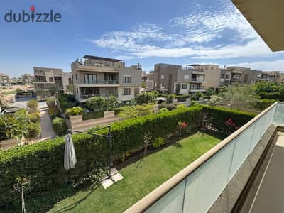 For sale opportunity directly in front of New Giza University, a 260-meter apartment with a garden, furnished, and ready for living at a bargain price in Pyramids Heights compound.