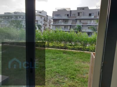 Prime Location Luxury Apartment with a private garden 70 sqm and a spacious living area available for rent at the lowest price in Villette , New cairo