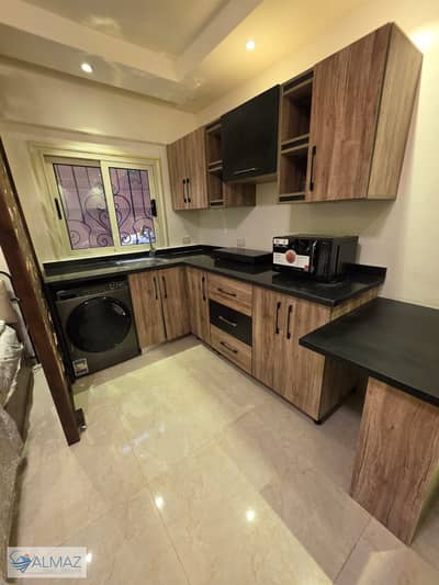 Furnished basement studio for rent in Al Banafseg 1 Villas, First Settlement, located opposite Rehab City and The Waterway.