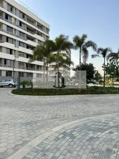 Apartment for sale in Bloomfields with a direct view of the landscape and clubhouse in Mostakbal City Direct, on the Suez Road.