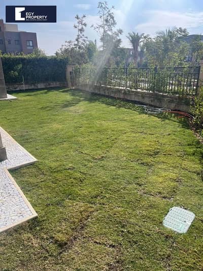 بموقع خيالي شقة بحديقة خاصة تطل علي مساحات خضراء للبيع في ديستريكت 5 - القاهرة الجديدة