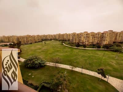Apartment for sale in Madinaty, 175 sqm, wide garden view, near the mosque, services, and Open Air Mall.