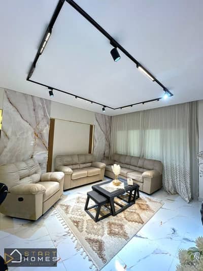 A 100-square-meter, two-bedroom furnished apartment is available for rent in Privado Compound, Madinaty, next to Privado Mall. It includes fully equip
