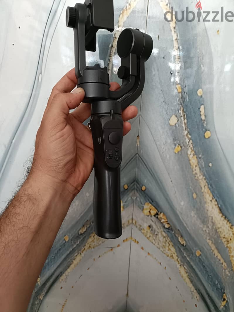 3-axis handheld gimbalجامبل تصوير 1