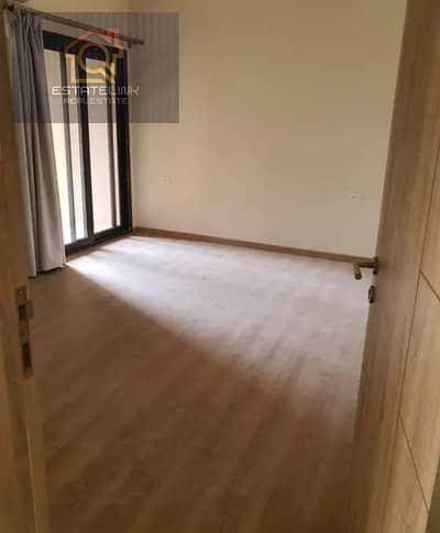 A distinctive apartment with a kitchen and air conditioning.