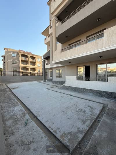A ground-floor apartment in a prime location within Phase 2, featuring a spacious layout and a private garden. The unit is semi-finished and includes