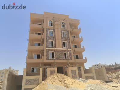 125m² apartment with a garden view, ready for immediate occupancy, in the second district next to Al Ahly Club, with installments over 36 months.