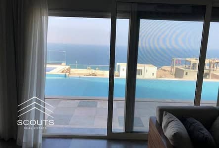Chalet for sale in Ain Sokhna at the old price, with a sea and lagoon view, fully finished, in the Ilmont Galala village next to Porto Sokhna and La V