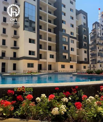 Apartment with a landscape and lake view, ready to move in a prime location in the Investors area and with free clubhouse access in New Capital