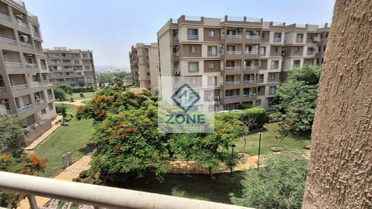 In Madinaty, Phase 6, apartment buildings for rent, 103 sq m, garden view, steps from services, 3 bedrooms and 2 bathrooms. MADINATY B6