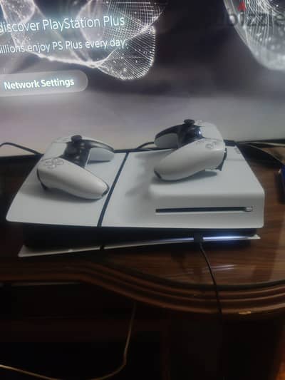 Play Station 5 slim cd edition with 2 original controllers and cables