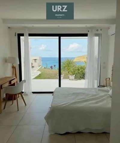 Two-bedroom chalet, first row on Crystal Lagoon, for sale in Ras El Hekma North Coast next to modon near Mountain View cali coast dose  La Vista