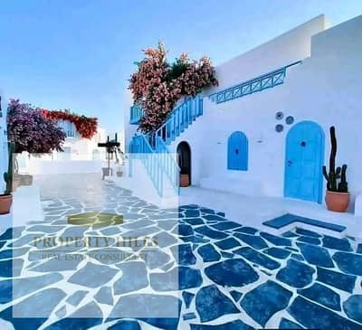 تاون هاوس بحري بأكبر جاردن خطوات للبحر في الساحل الشمالي من Mountian view
