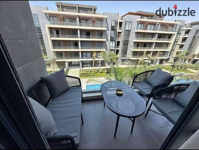 fully finished apartment with a garden Apartment for sale in New Cairo, prime and vibrant location in Fifth Settlement, Al Patio Oro Compound