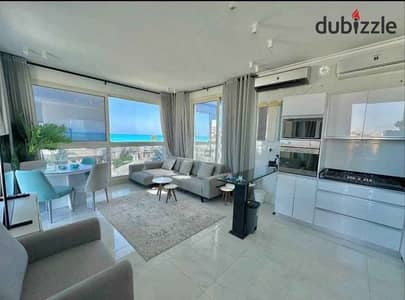 Sea-view chalet with lagoon, finished with ACs and kitchen, for sale in installments in La Vista, next to Fouka Bay, Ras El Hekma, minutes from Silver